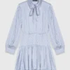 Vestido camisero fluido con tachuelas Vestido camisero fluido con tachuelas