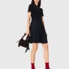 Vestido con cuello polo y minipliés Vestido con cuello polo y minipliés