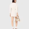 Vestido corto de tweed con mangas abullonadas