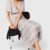 Vestido midi con volantes metalizados Vestido midi con volantes metalizados