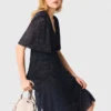 Vestido midi con volantes metalizados