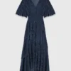 Vestido midi con volantes metalizados